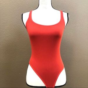 Anthropologie orange racer back tank onesie Sz M